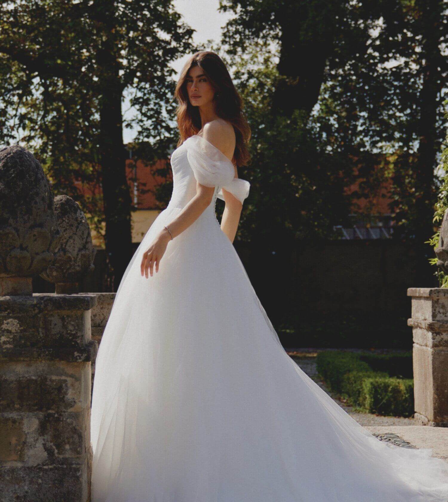 Model wearing a bridal dress. Mobile image
